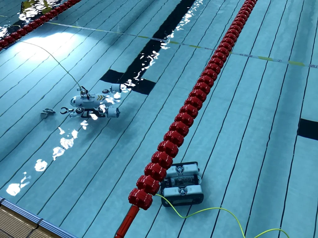 ROV being put through a function test in a pool